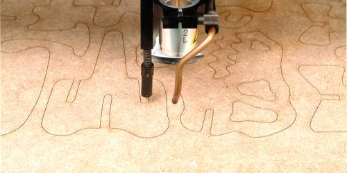 Dinosaur laser wood cutting