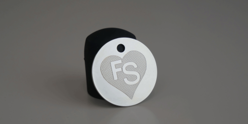 Metal medal engraved