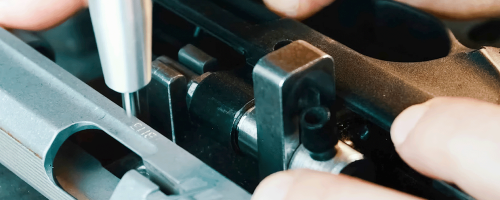 Dot peen marking on handheld gun