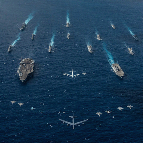 Composition of aircrafts and war ships on a sea background